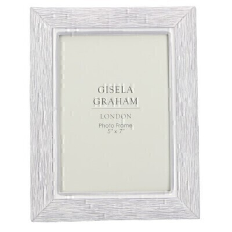 This large grey resin picture frame fits a 5x 7 inch photo. Made by London based designer Gisela Graham who designs really beautiful gifts for your home and garden.  This photo frame would suit any home decor and would make a lovely gift. Matching smaller photo frame also available.